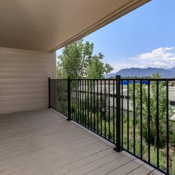 Balcony with a beautiful view of the mountains at Parc at Prairie Grass, located in Colorado Springs, CO