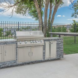 Beautiful outdoor stainless steel gas grill with counter space at Parc at Prairie Grass, located in Colorado Springs, CO
