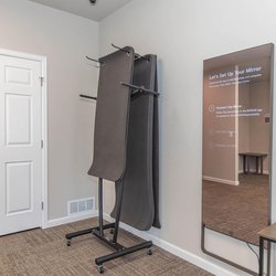 Mirror and workout mats in the fitness center at Parc at Prairie Grass, located in Colorado Springs, CO